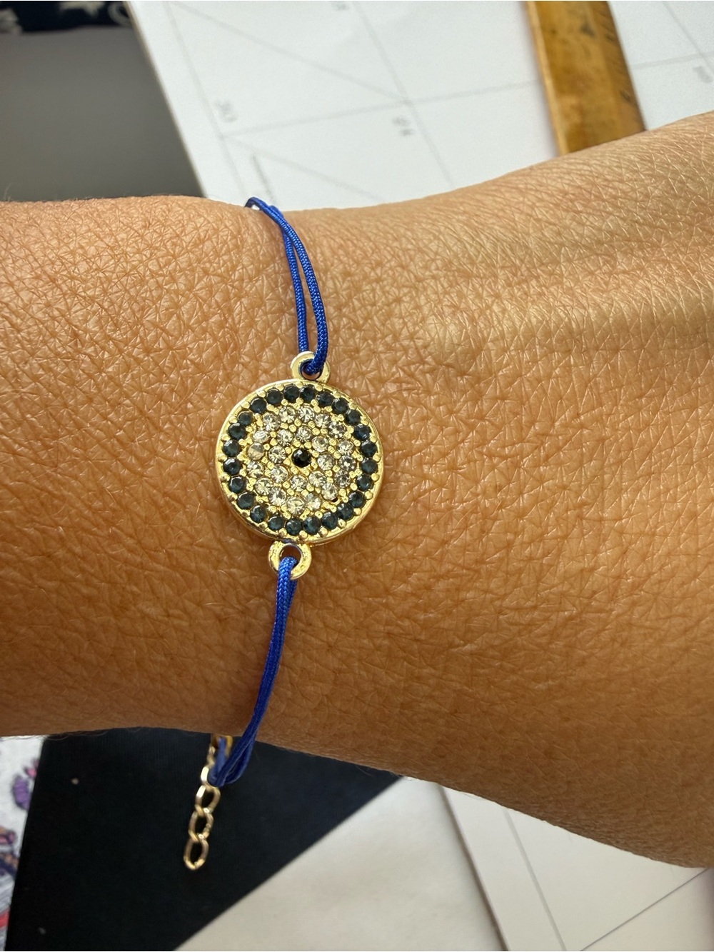 Gold Disc Crystal Bracelet with Blue Cord